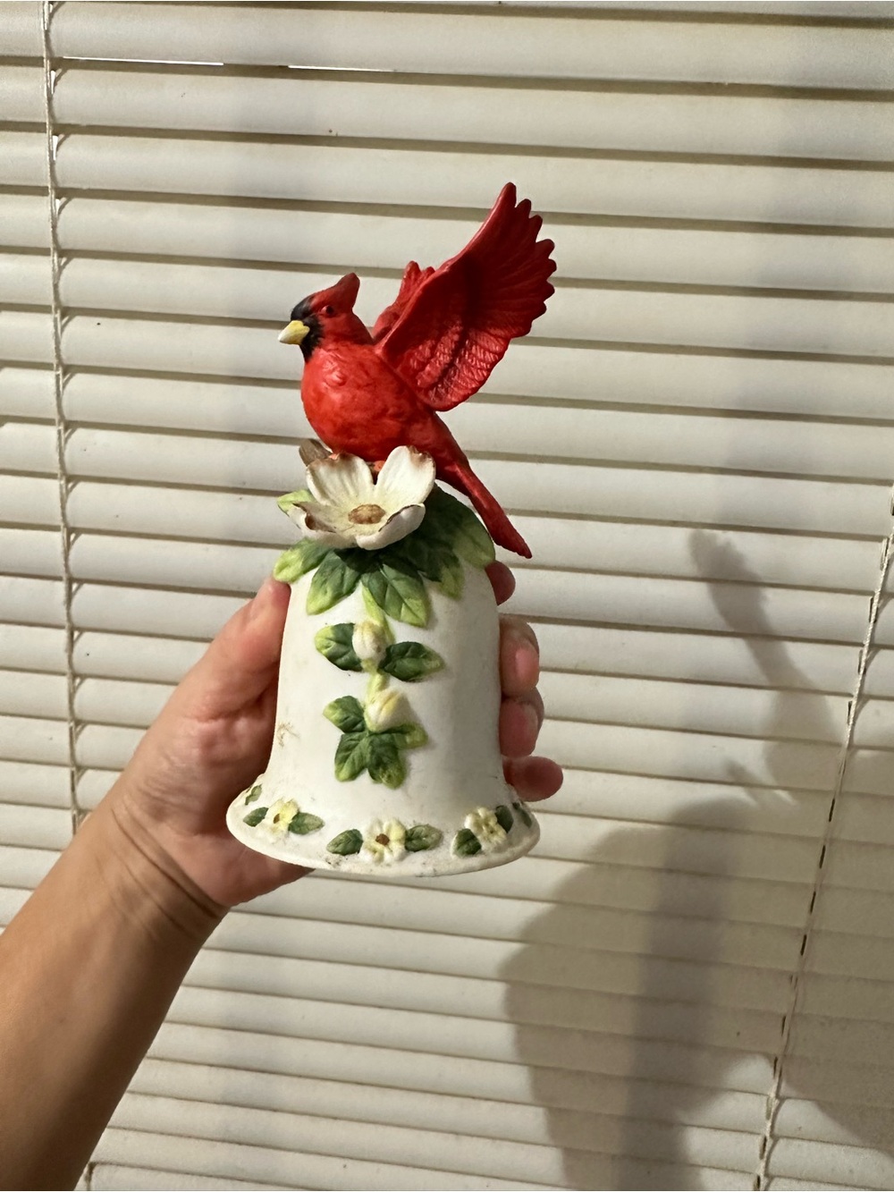 cardinal figurine bell